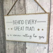 BEHIND EVERY MAN - sign