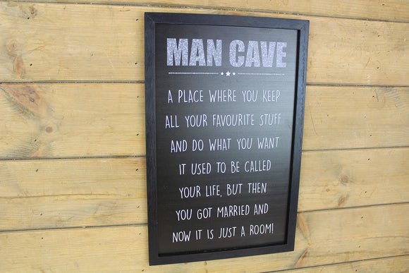 MAN CAVE sign